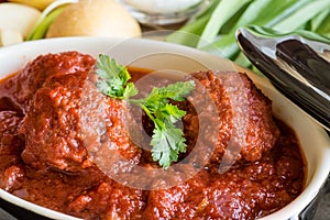 Juicy Meatballs with Tomato Sauce and Ingredients for Cooking