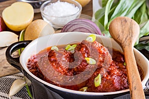 Juicy Meatballs with Tomato Sauce and Ingredients for Cooking