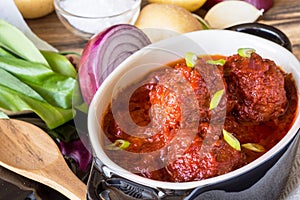 Juicy Meatballs with Tomato Sauce and Ingredients for Cooking