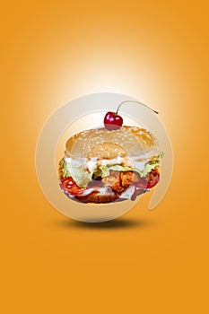 Juicy mini snack flying burger, hamburger or cheeseburger with one chicken patties, with sauce. Concept of American fast food.