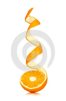 Juicy orange with peeled spiral skin