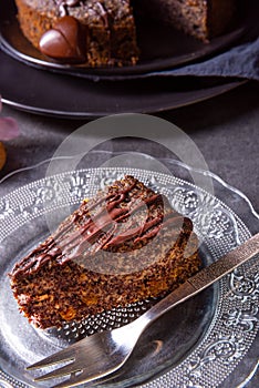 Juicy poppy seed cake with apples and chocolate glaze