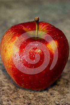 Juicy red apples with water drops