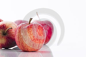 Juicy red apples on white background