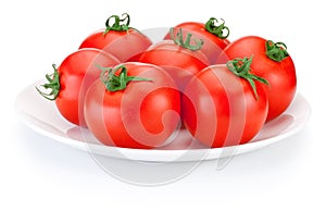 Juicy red tomatoes white plate isolated on white background
