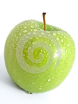 Juicy ripe green apple on a white background