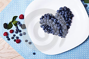 Juicy ripe natural organic raspberries blueberries blackberries
