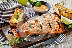 Salmon fillet on cedar wood plank