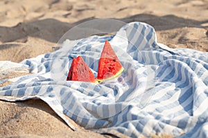 Juicy slice of watermelon against natural summer background