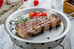 juicy Striploin Steak on white wooden table