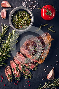 Juicy tender sous-vide grilled irish beef rump steak with fresh herbs