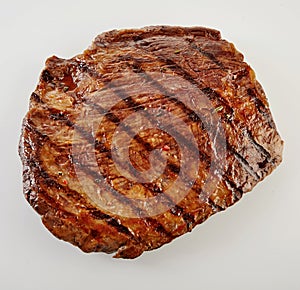Juicy thick medallion of lean flank beef steak photo