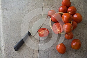 Juicy tomatoes on grey background