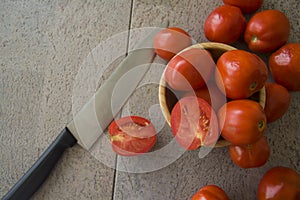 Juicy tomatoes on grey background