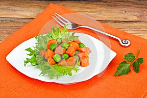 Juicy Vegetable Stew. Lettuce, Peas and Carrots. Diet Food photo