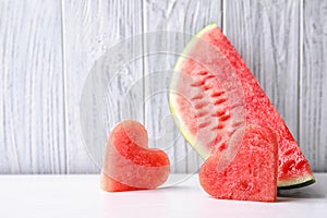 Juicy watermelon slices on table