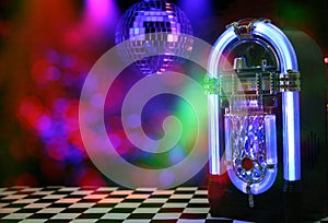 Jukebox in Bar with Disco Ball and Bokeh photo