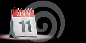 July 11 Calendar Spotlighted on Black Background