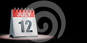 July 12 Calendar Spotlighted on Black Background
