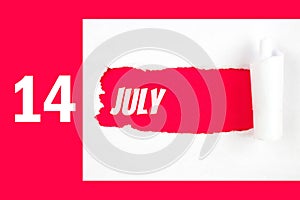 July 14th. Day 14 of month, Calendar date. Red Hole in the white paper with torn sides with calendar date. Summer month, day of