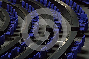 July 1st 2023 - Reichstag seats, parliament interior image with rows of reichstag blue seats and grey tables, Berlin