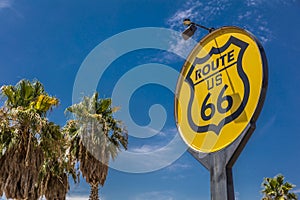 JULY 30, 2018 - SOUTHERN CALIFORNIA DESERT - USA - Yellow sign signifies Route US 66 - Nostalgia in middle of California Desert