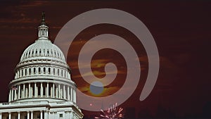 July 4th Independence day show cheerful fireworks display on the US Capitol Building in Washington DC USA during