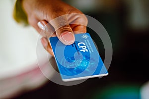 July 4, 2020, Brazil. Woman holding document