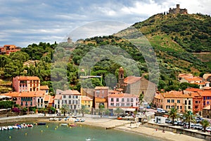 17 JULY 2009, COLLIOURE, FRANCE - people enjoying the summer holidays on the beach of Collioure