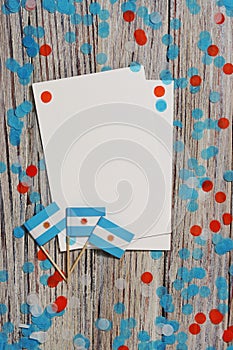 july 9. Independence day of Argentina, the concept of the Day of memory, freedom and patriotism. Mini flags with paper confetti photo