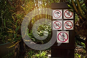 26 july 2020, Royal park ,ChaingMai, Thailand. Warning sign on display of Do not open umbrella,  Do not pick flowers, Do not ride