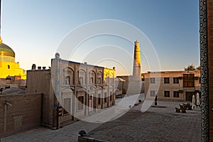 Juma mosque minaret in Khiva. Uzbekistan. empty street of an ancient medieval city Itchan Kala, Khiva, Khorezm region