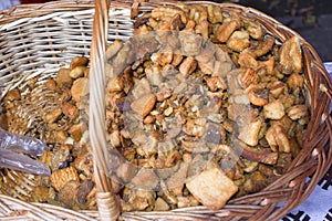 Jumari, delicious unhealthy fried pork greaves in a basket for sale