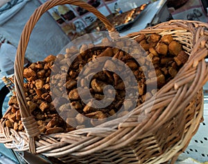 Jumari, delicious unhealthy fried pork greaves in a basket for sale during street food festival