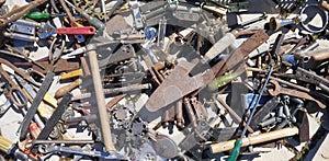 Jumble of old rusty hand tools