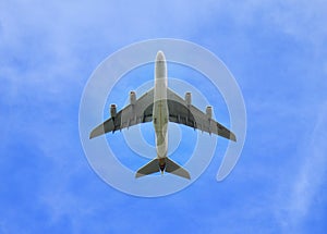 Jumbo Jet aeroplane directly in the sky above