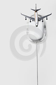 Jumbo jet on apple macintosh computer mouse digital composite photo