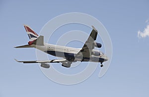 Jumbo 747 passenger jet with landing gear down