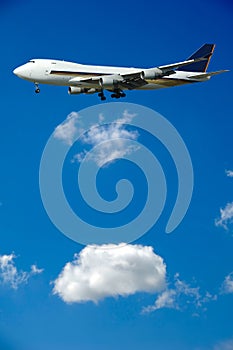 Jumbo plane and clouds