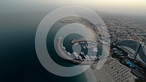 Jumeirah Beach near Burj Al Arab hotel in Dubai, UAE. Helicopter view