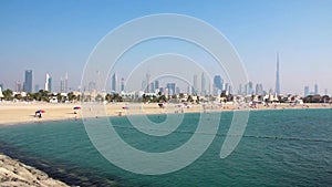 Jumeirah beach, Persian Gulf, Dubai downtown and Burj Khalifa, United Arab Emirates
