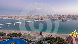 Jumeirah Palm island skyline day to night timelapse in Dubai, UAE.