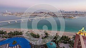 Jumeirah Palm island skyline day to night timelapse in Dubai, UAE.