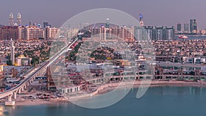 Jumeirah Palm island skyline day to night timelapse in Dubai, UAE.