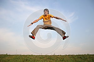 Jump boy on meadow 2