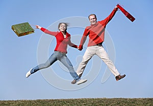 Jump couple with bags