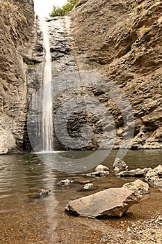 Jump Creek Falls waterfall, Marsing, Idaho in the Owyhee Mountains, left close portrait