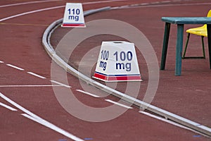 Marking on the hurdles race on a racing track photo