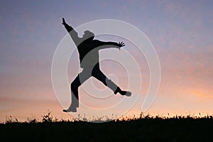 Jump man on sunset