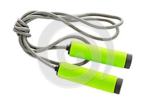 A jump rope with a bright light green handles isolated on white background.
